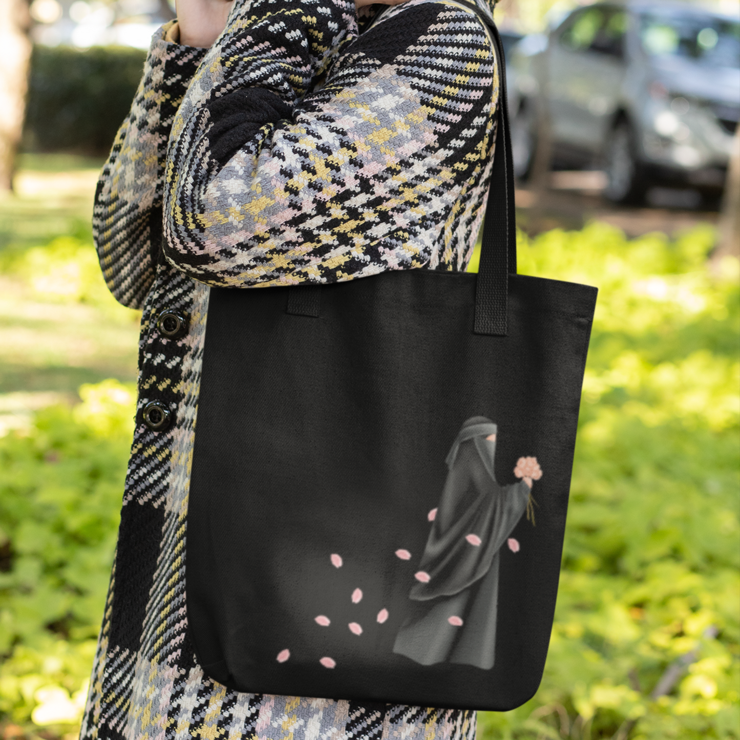 Niqabi Walking with Falling Flower Petals Black Tote Bag