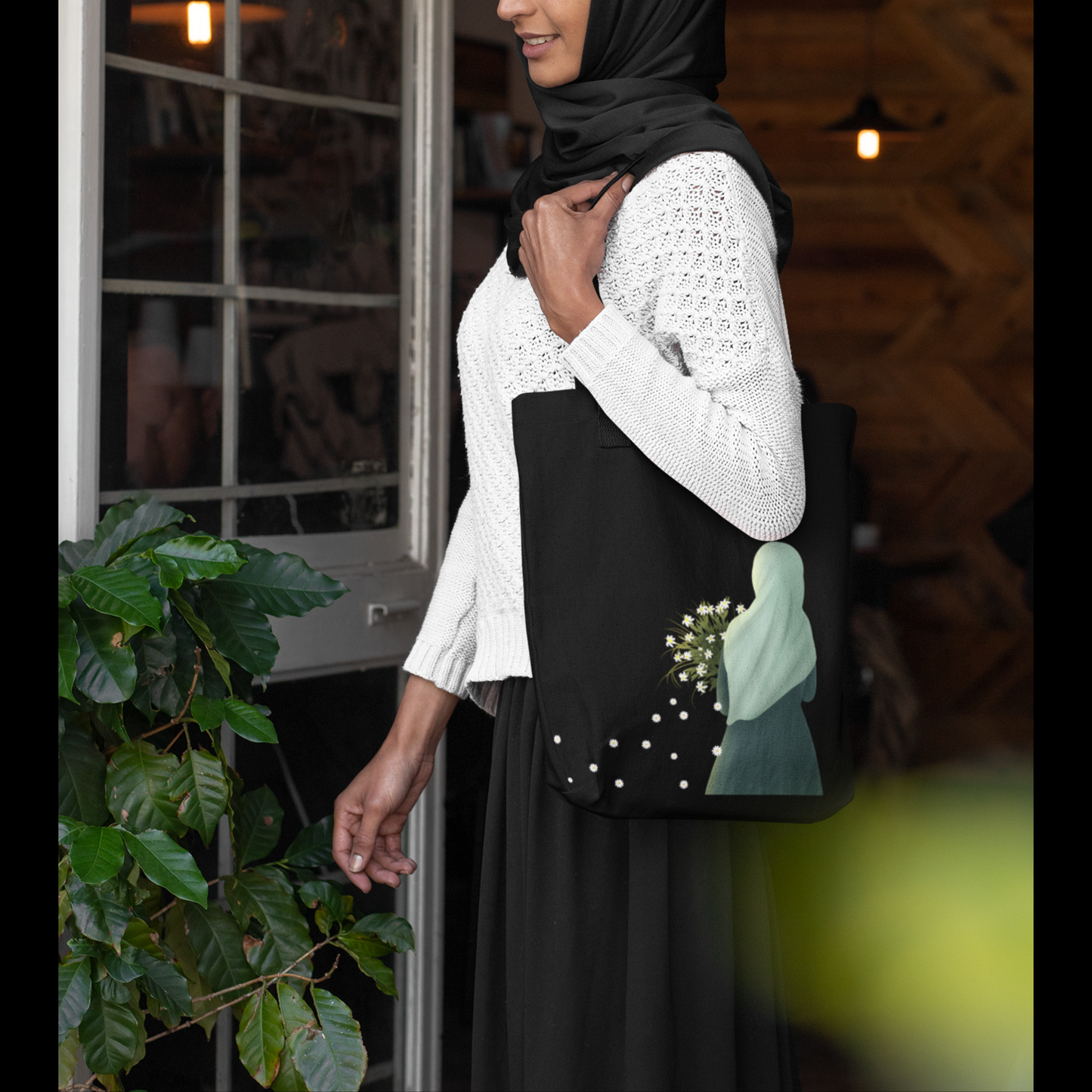 Hijabi Holding White Flowers Tote Bag for Muslimahs
