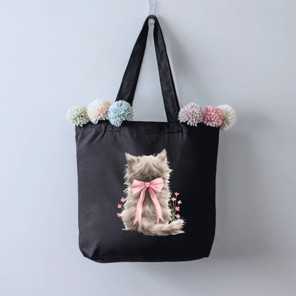 Kitty sitting in Flowers Tote